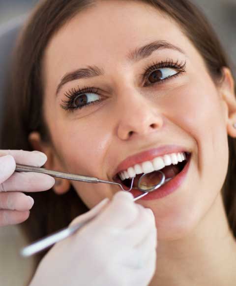 Why do you need to visit your dentist regularly every 6 months?